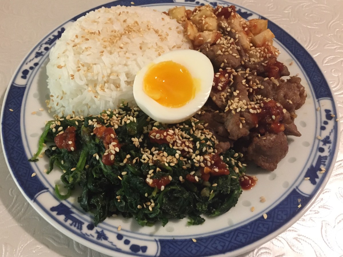 Korean porkfilé with rutabagakimchi, sesamefried spinnach and softboiled&nbsp;eggs.